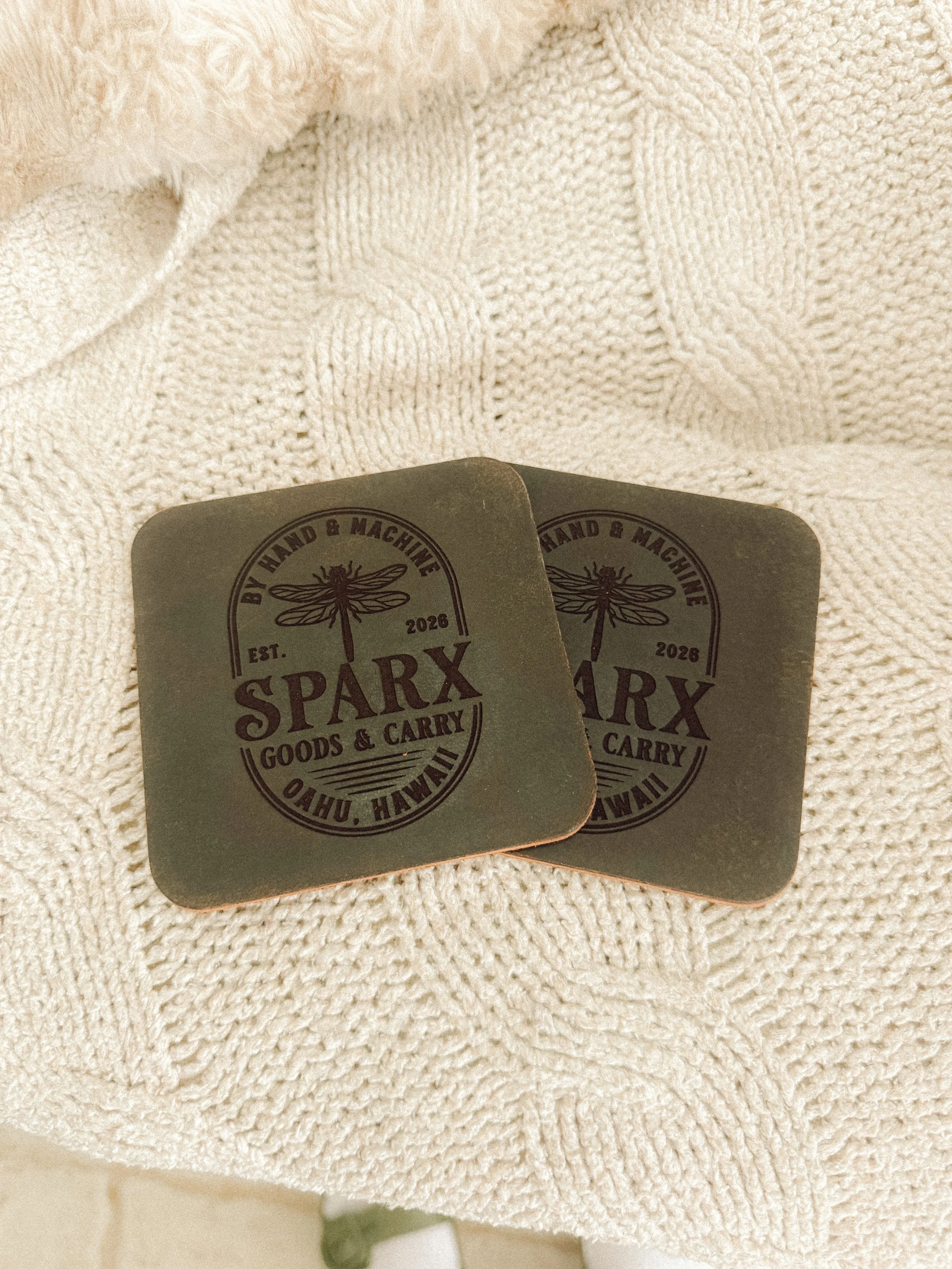 A collection of small leather wallets in various colors from Oahu Hawaii