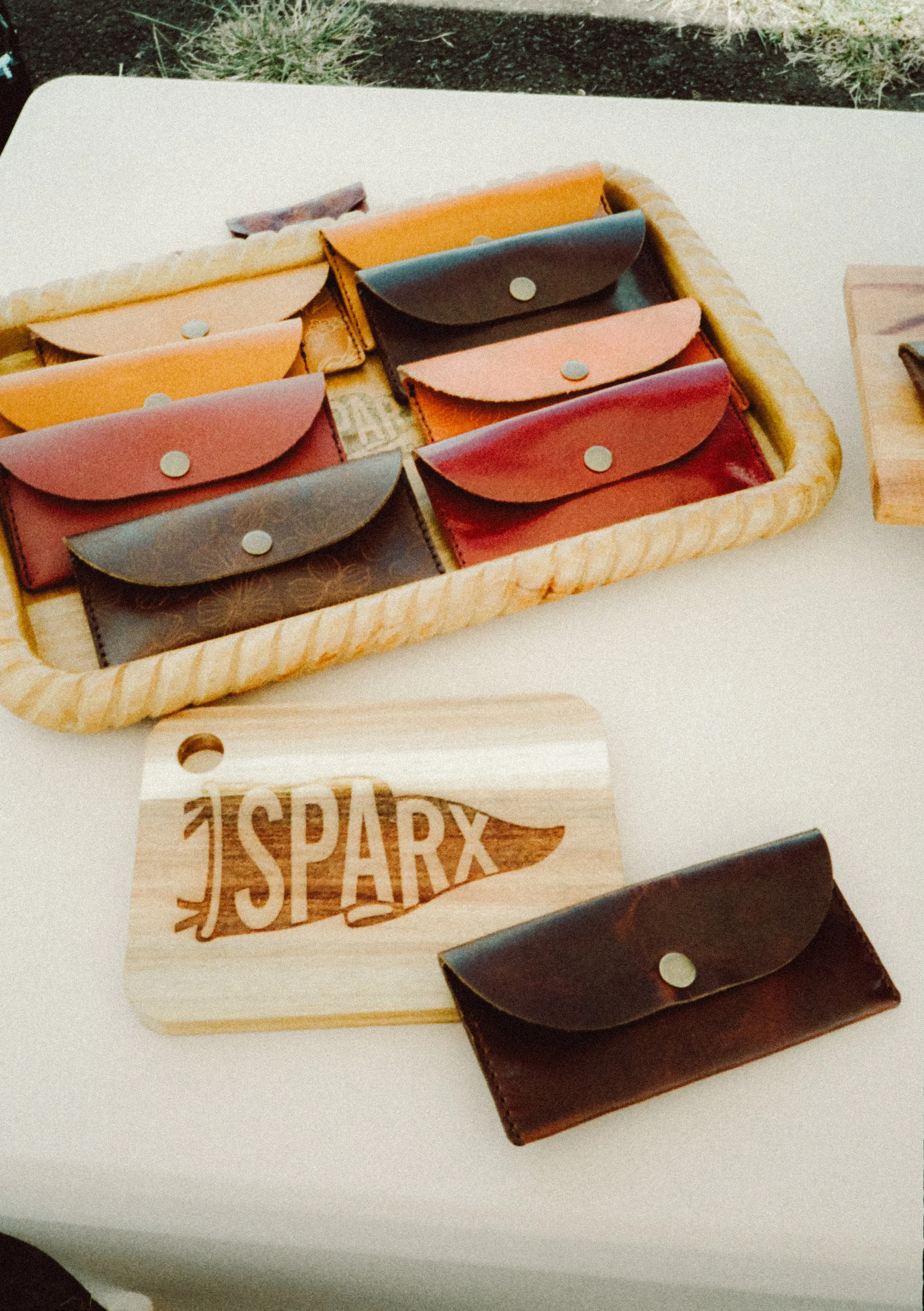 A collection of small leather wallets in various colors from Oahu Hawaii