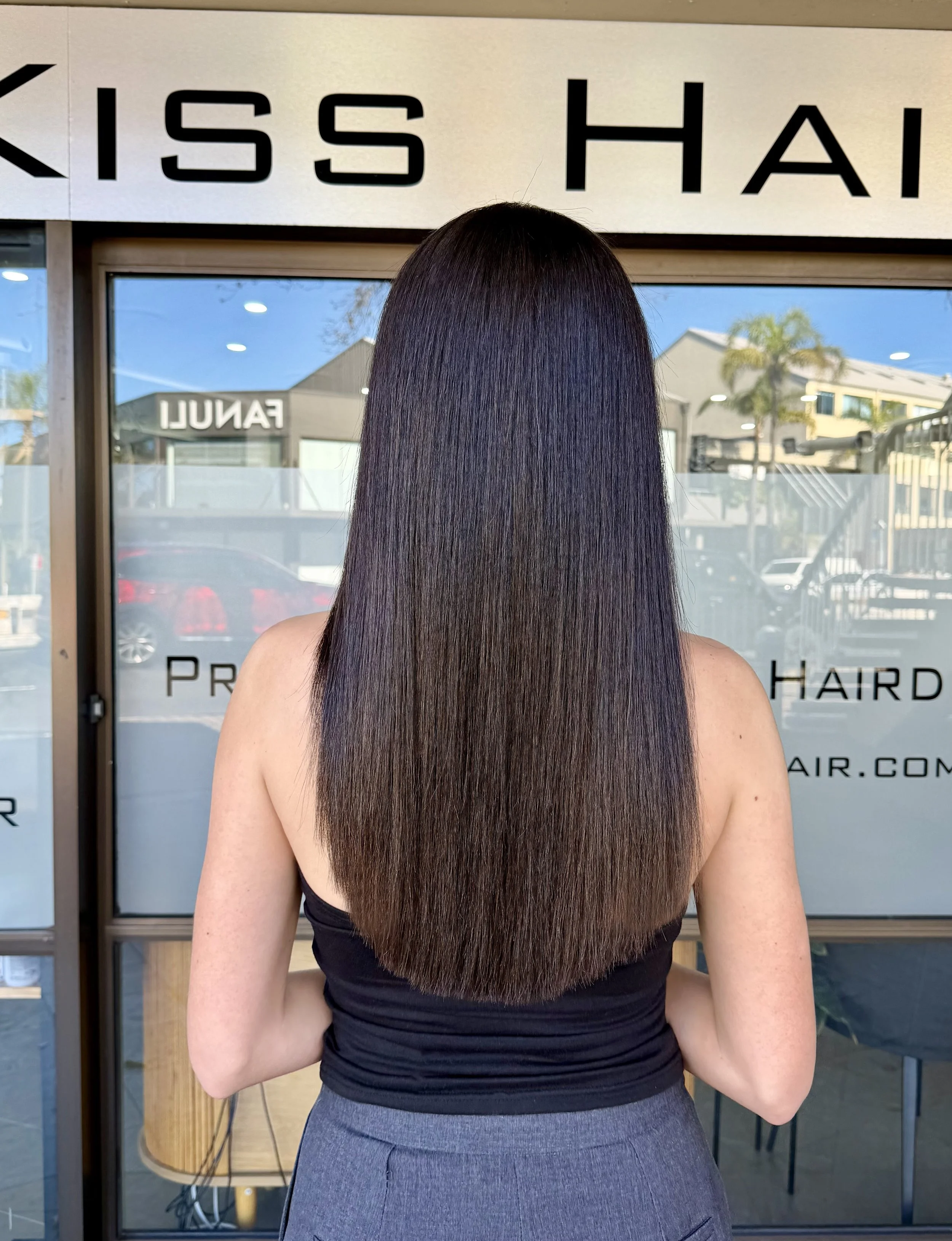 Long, smooth, frizz-free brunette hair after a Floractive nanoplasty treatment at Janos Kiss Hair salon in Cremorne, Sydney