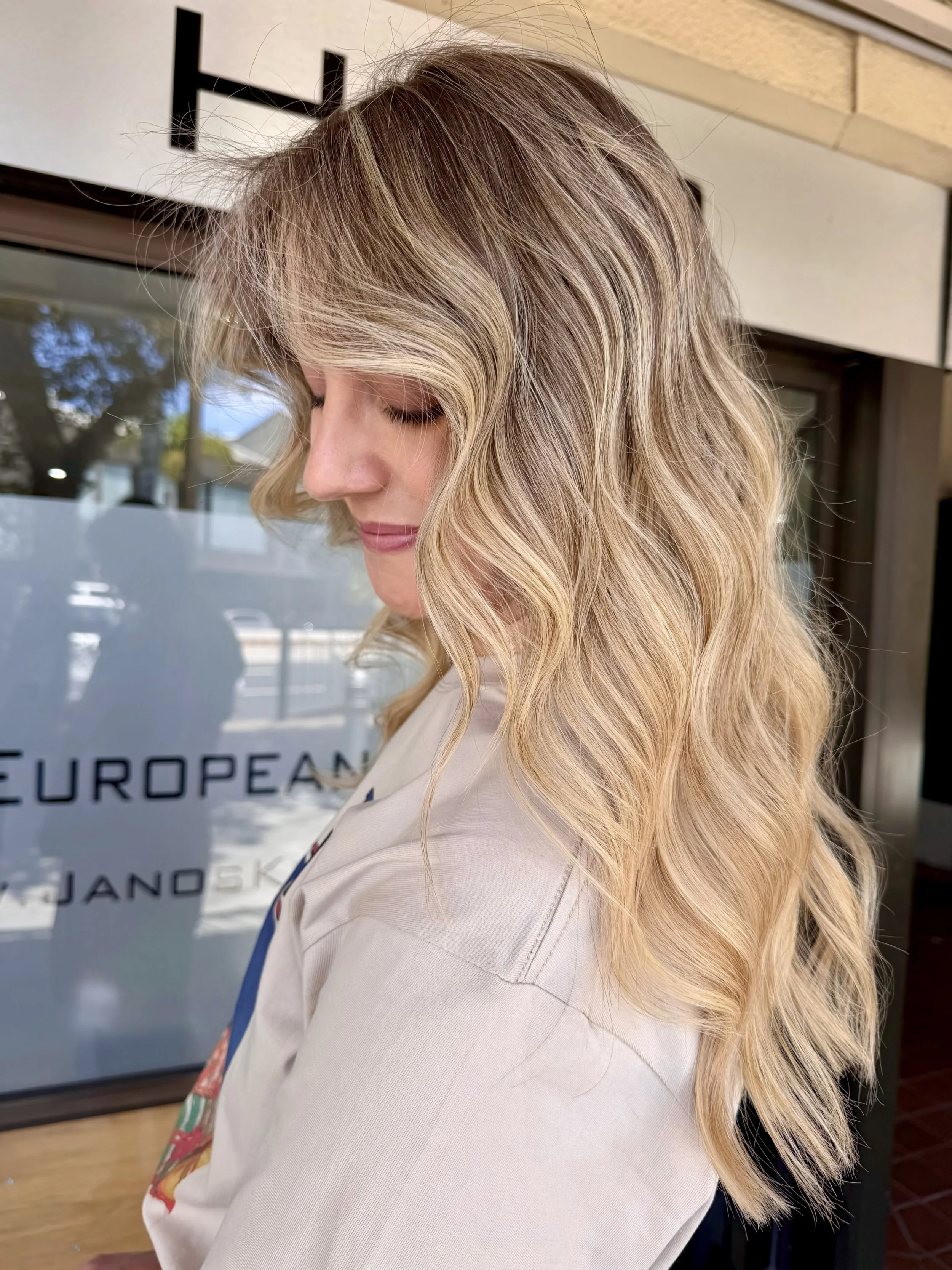 Long wavy blonde Airtouch with a soft rooted blend, Janos Kiss Hair, Cremorne