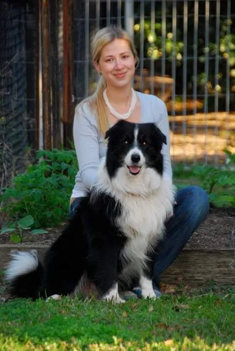 Star Puppy with a member of the Lapochka family