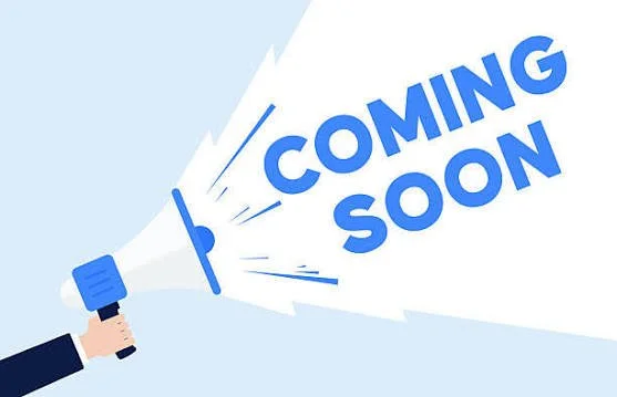 A hand holding a flashlight projecting a beam with the words 'Coming Soon' in blue text.