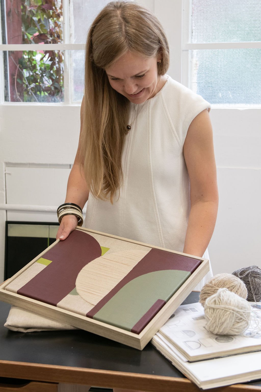 Simona Puidokaite in the Studio artist painting