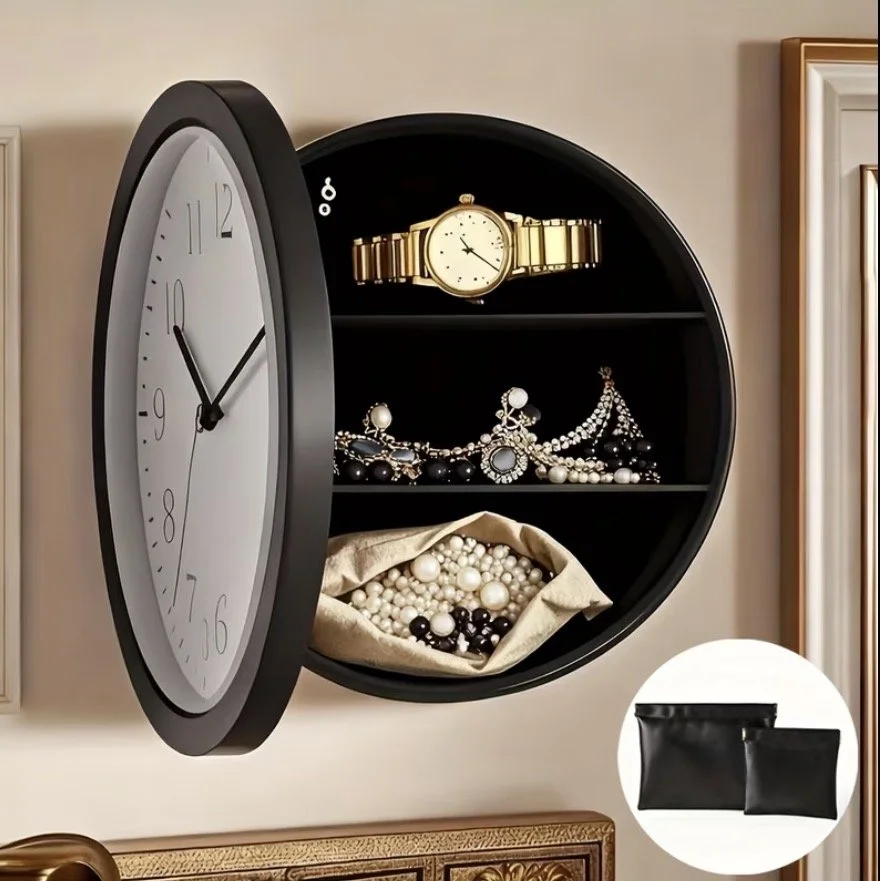 A black wall clock with a white face, resembling a traditional analog clock, is partially turned to reveal a black cabinet inside. The cabinet contains a gold watch with a metal band on the top shelf, jewelry including necklaces and bracelets in the 