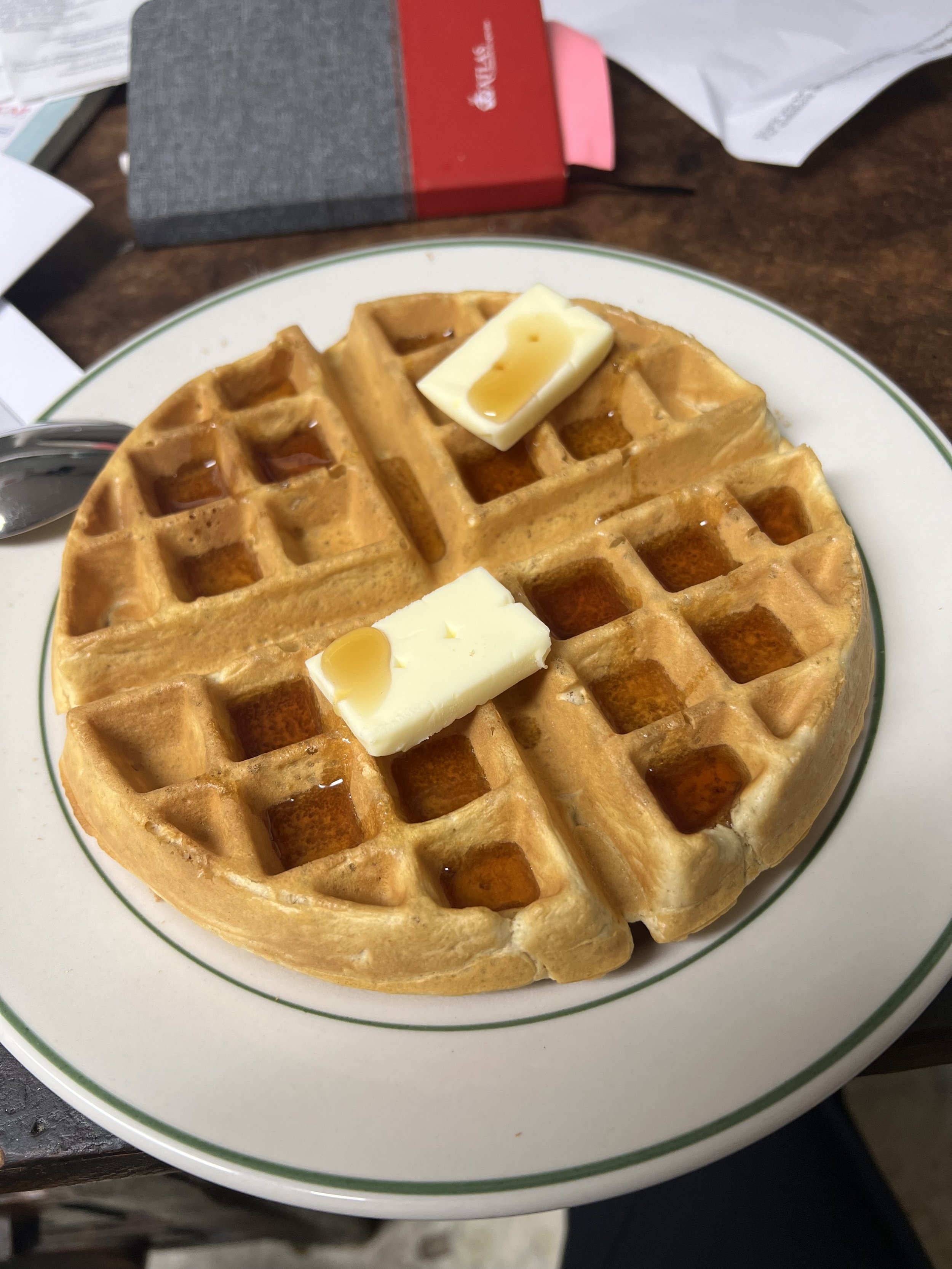 Two Belgian waffles with butter and maple syrup at Royal Diner, West Brattleboro VT