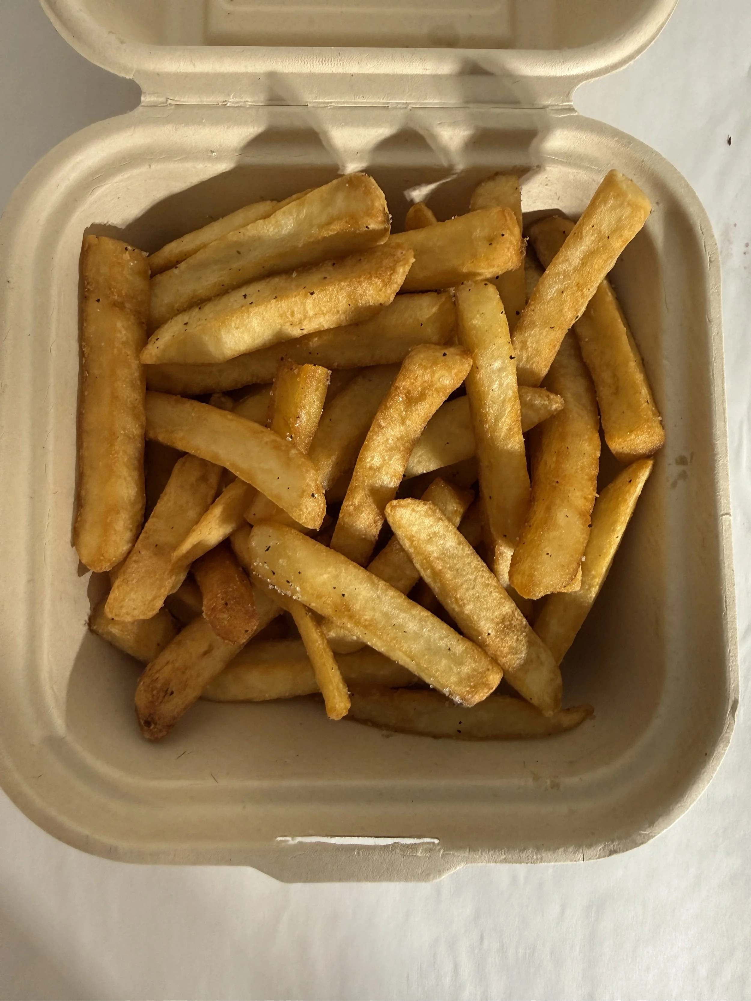 Takeout box of French fries from Royal Diner, West Brattleboro VT