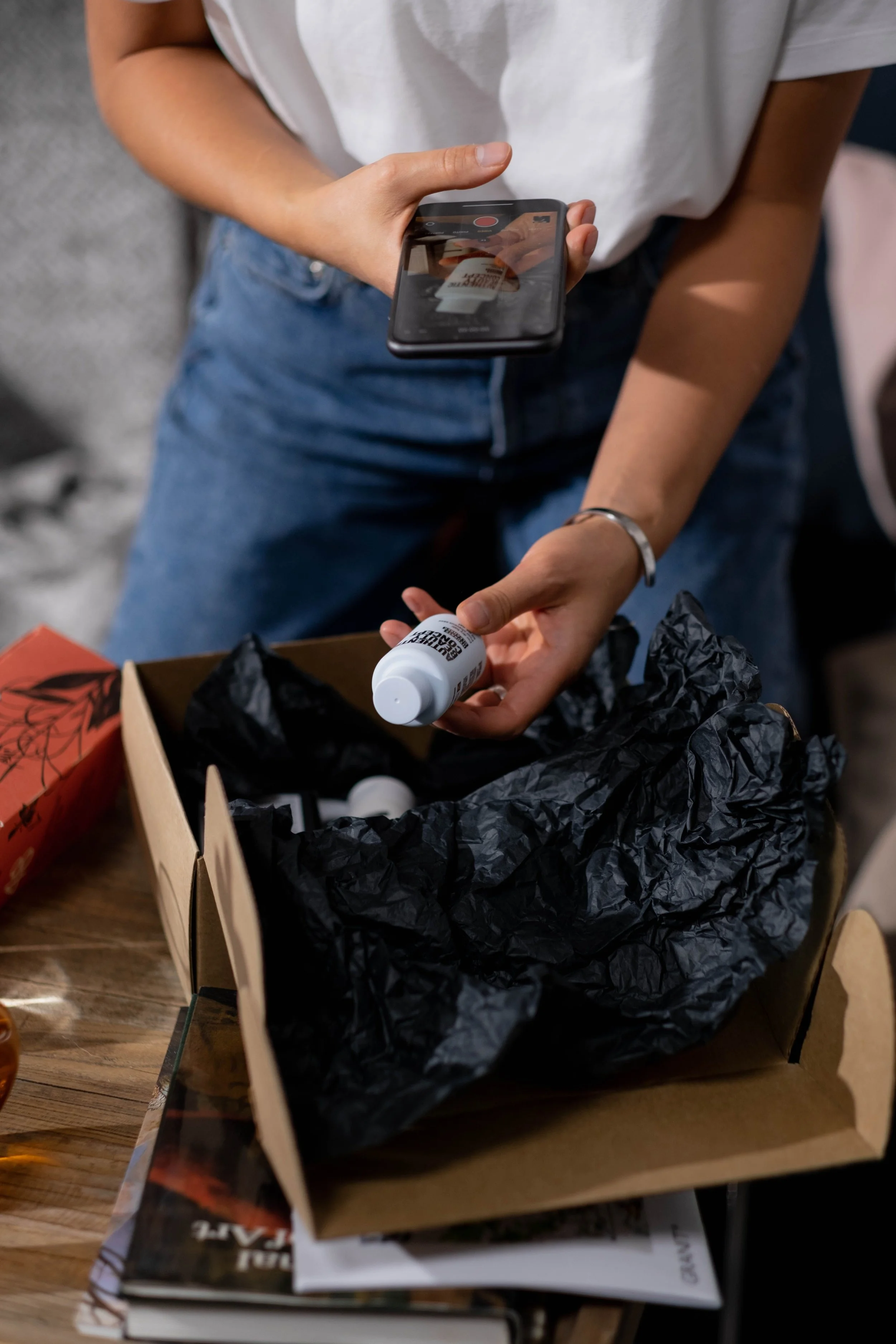 Influencer taking a picture of a product she received through the activation I organized