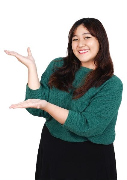 Smiling woman in a green sweater gesturing with her hands.