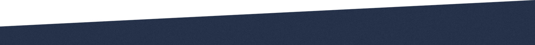 Close-up of a sleek, dark blue object with smooth contours.