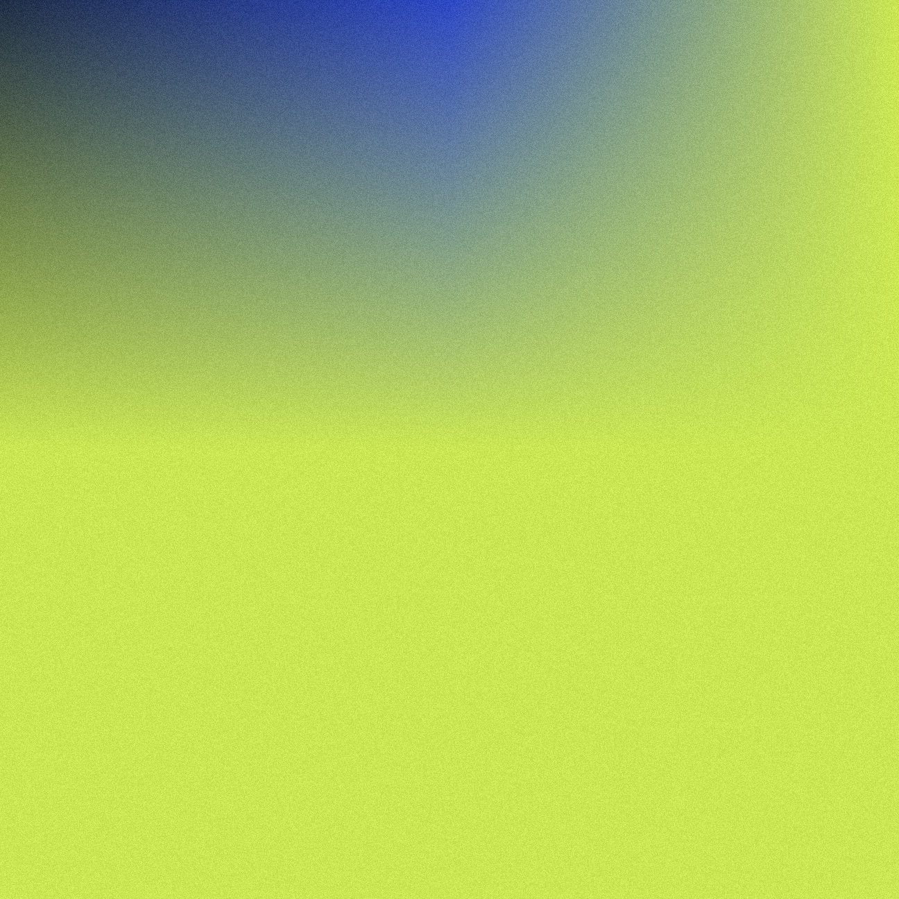 Close-up of a bright green textured surface with a blurred gradient background in blue and yellow.