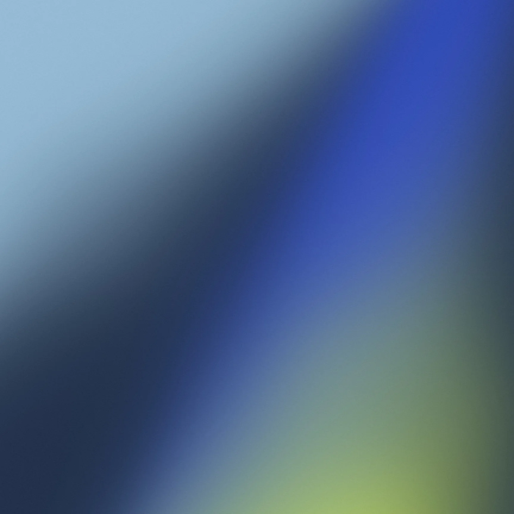 Blurred digital screen with a gradient of blue, purple, and green colors.