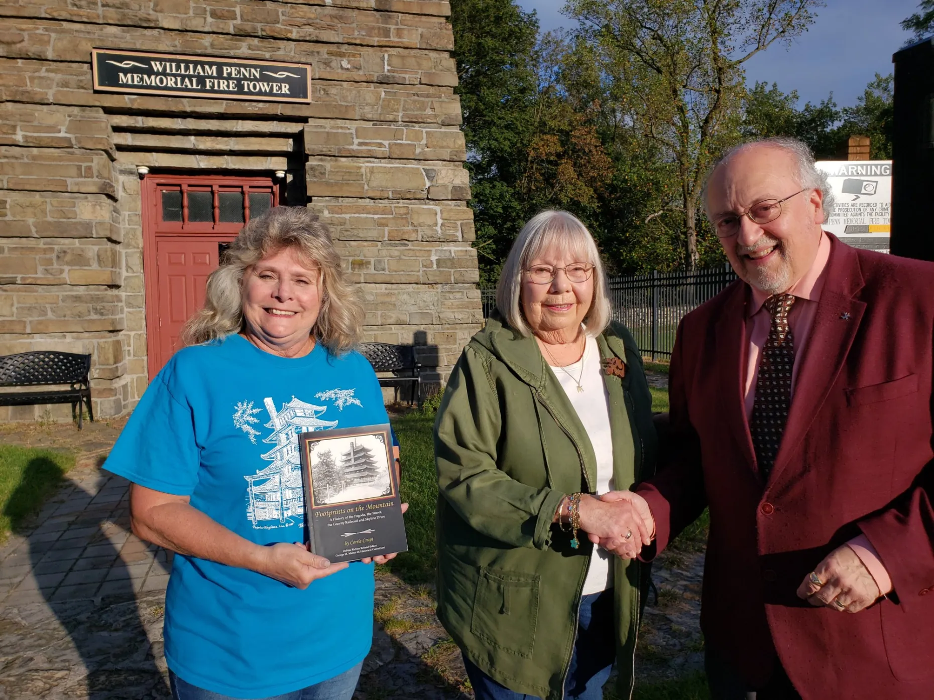 Kay E. Potteiger, center, of West Reading accepts a lifetime membership in Pagoda-Skyline Inc. from Corrie Crupi Zana, board chair, and Mike Reinert, president. The nonprofit helps to promote and preserve the fire tower atop Mount Penn. Potteiger's f