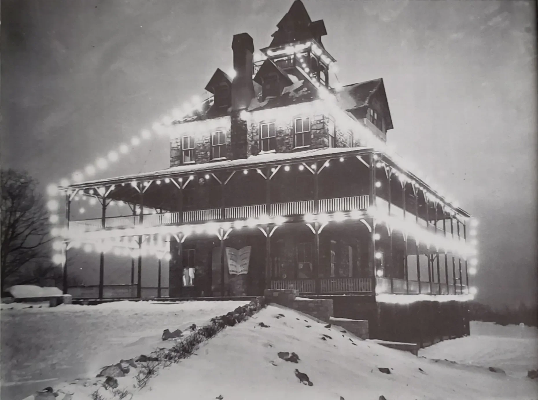 Schwartz's Summit House Hotel circa Christmastime 1933. The hotel was built atop Mount Penn as a resort for Mount Penn Gravity Railroad travelers. It was razed in 1959 and a small pavilion just east of the William Penn Memorial Fire Tower marks the l
