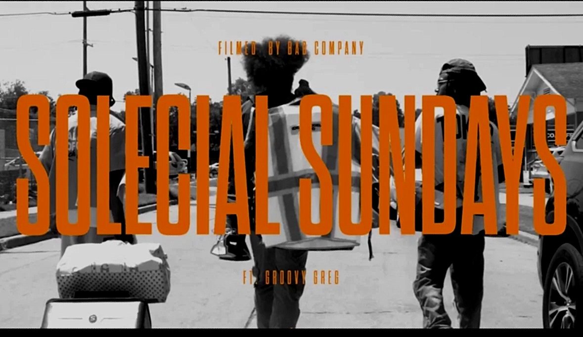 Black and white photo of three people walking down a street carrying musical equipment, with large orange text overlay reading "Solecial Sundays" and smaller text above and below.