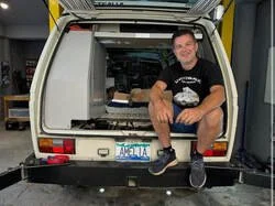 Shane Jordan with his Volkswagen van