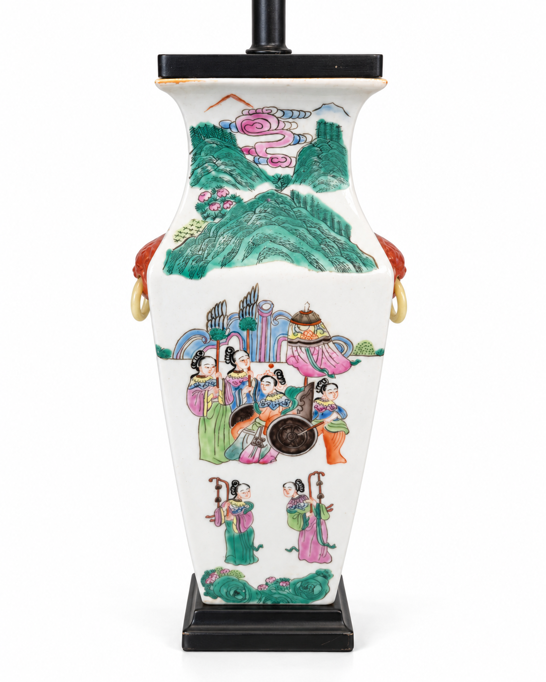 Green mountain landscape and ceremonial figures on a porcelain lamp body.
