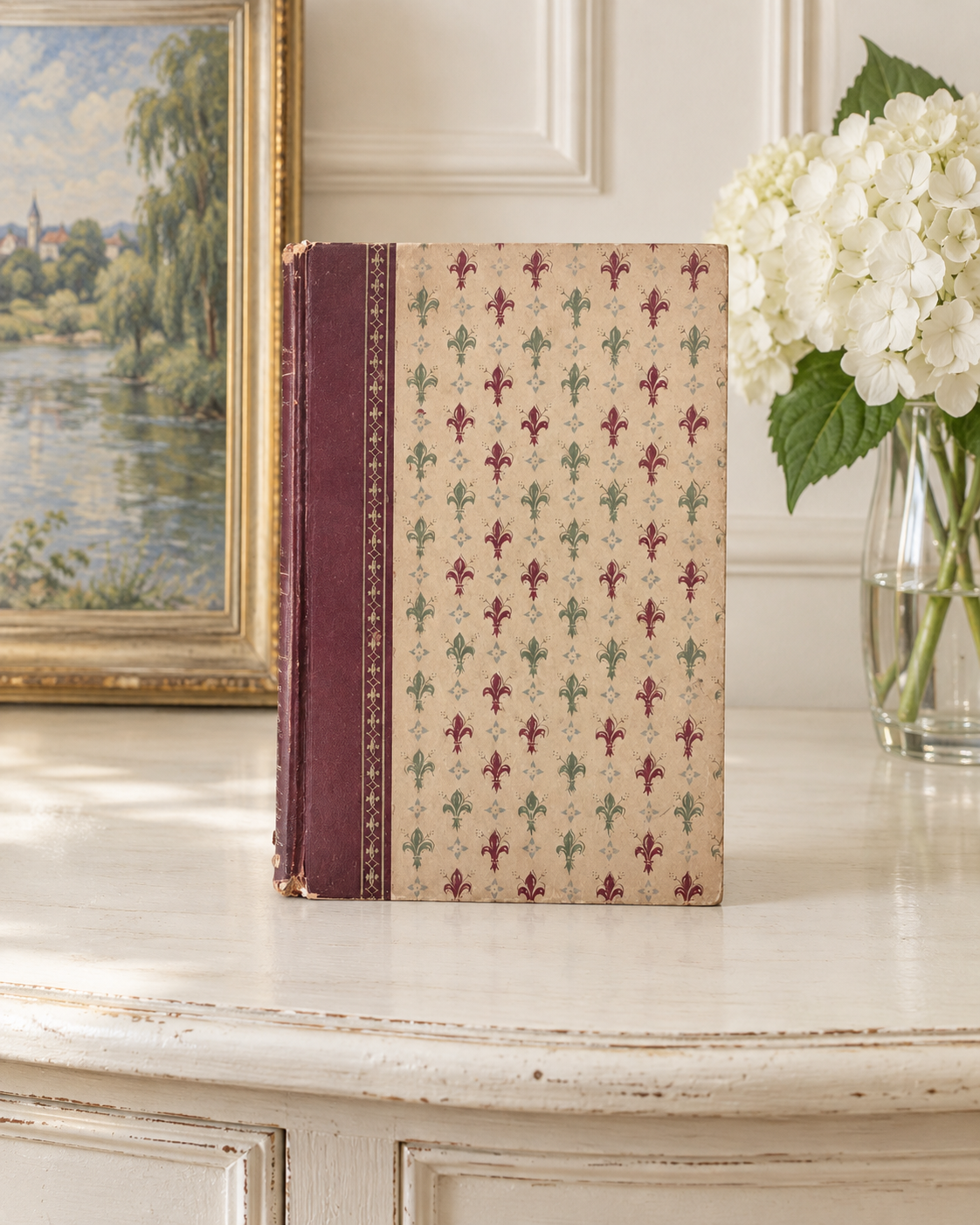 Patterned back cover of a vintage Brontë book in a French-inspired interior.
