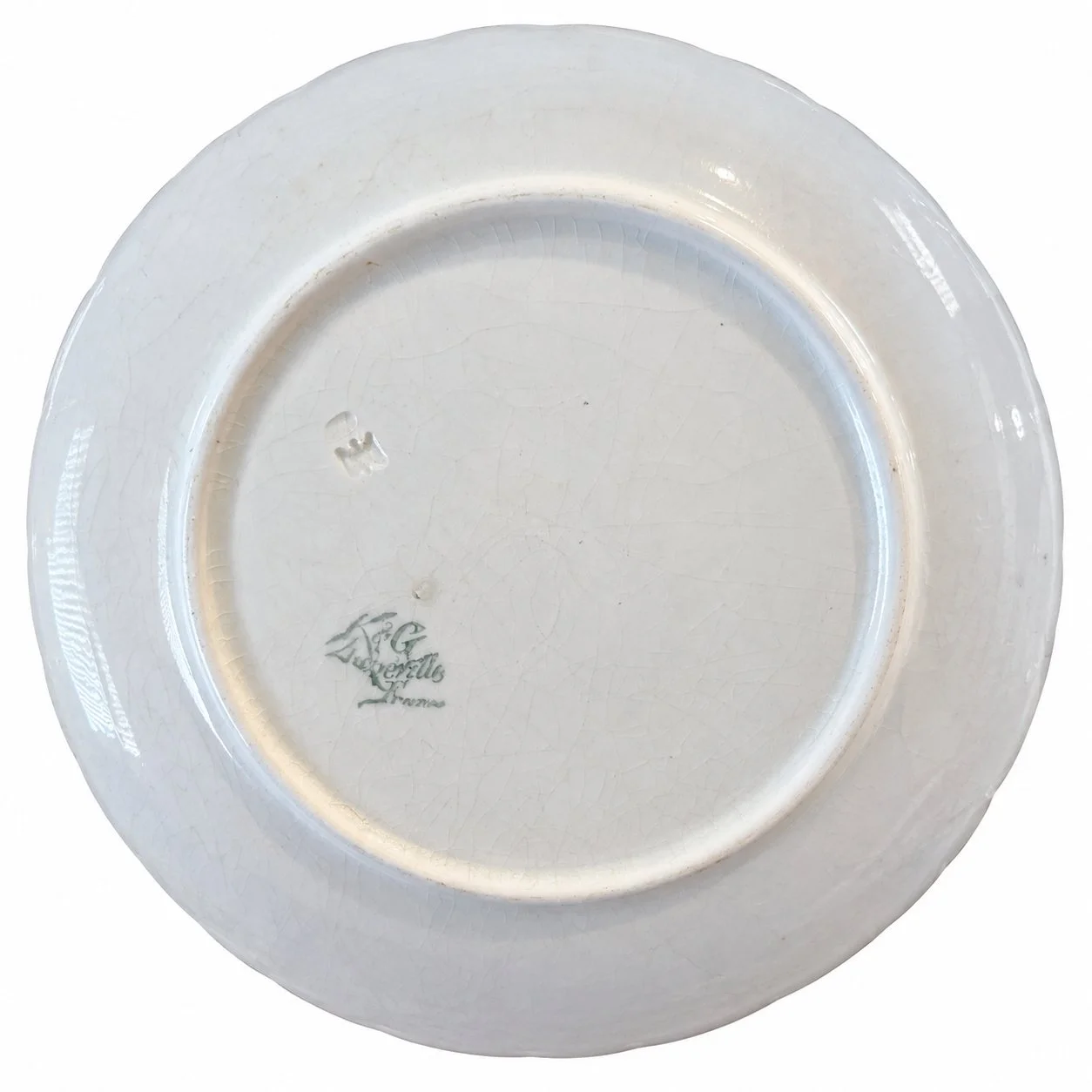 Reverse of the floral plate showing the K&G Lunéville France mark.