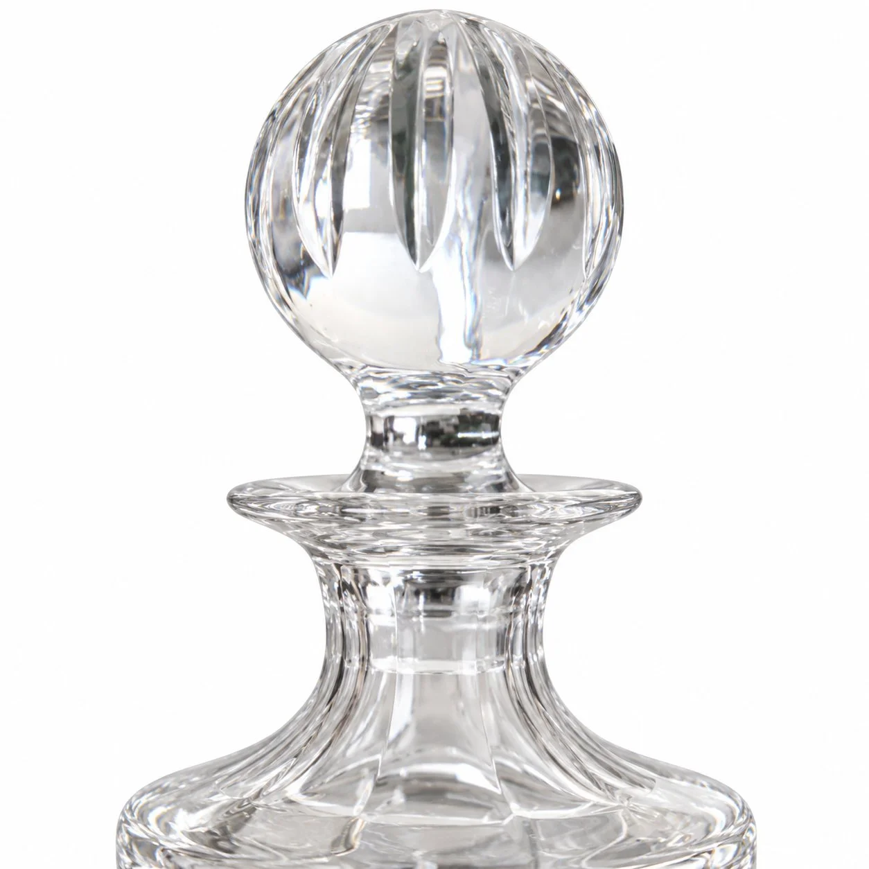 Detail of the decanter's neck, flared rim and faceted stopper on white.