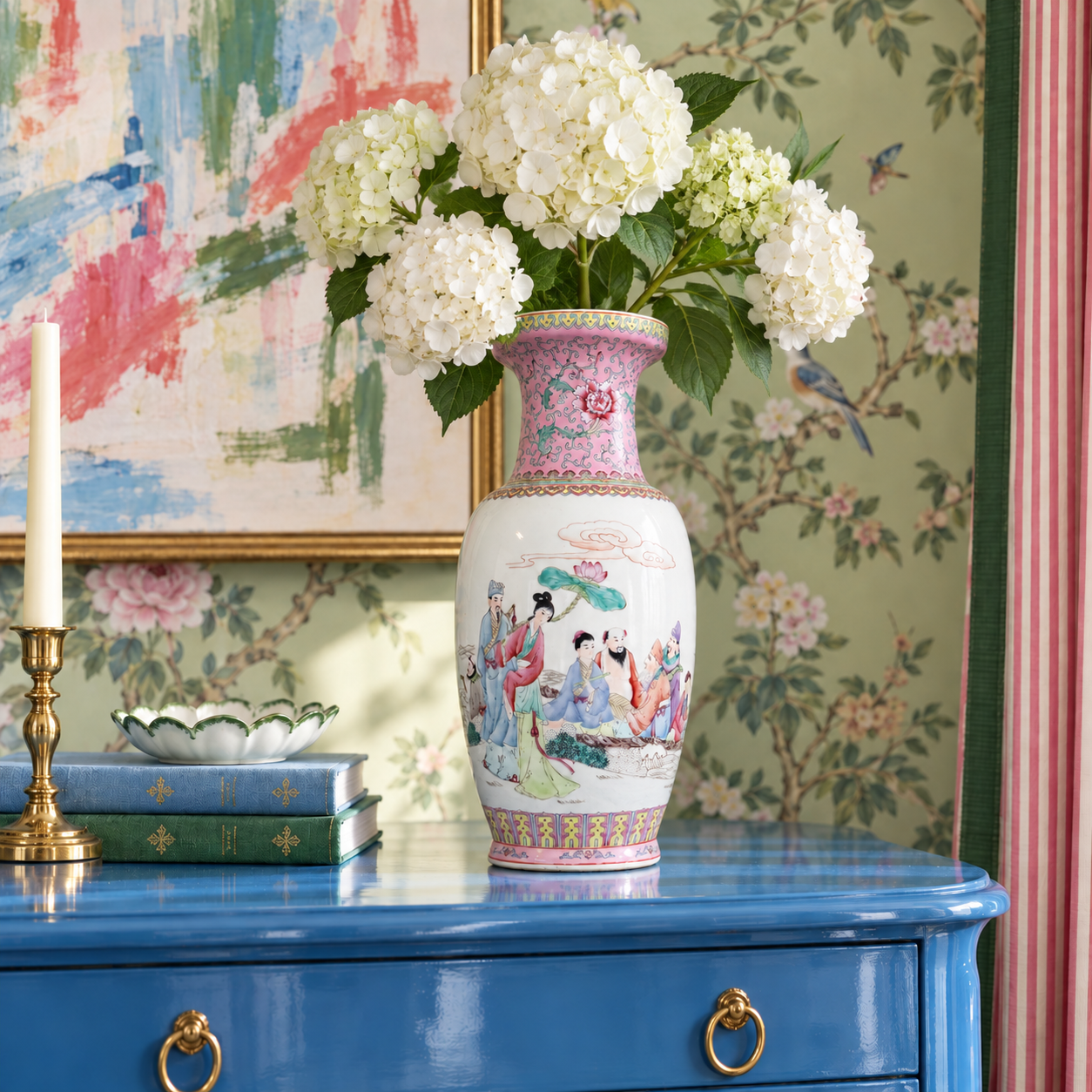 Alternate view of the figural porcelain vase showing robed figures, a lotus leaf and decorative borders.