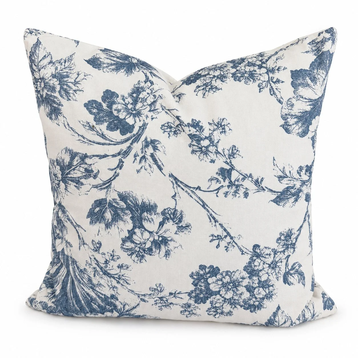 Blue and ivory botanical throw pillow centered on a white background.