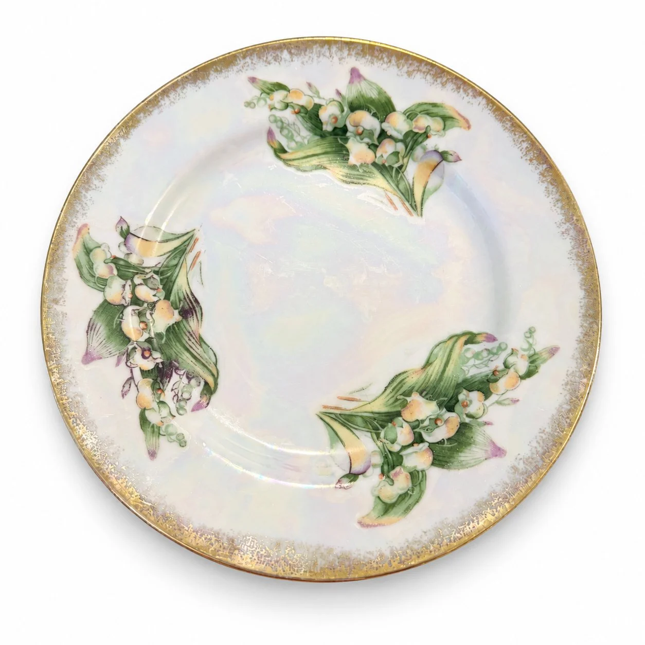 May Lily of the Valley plate with floral bouquets and a gold-colored edge on white.