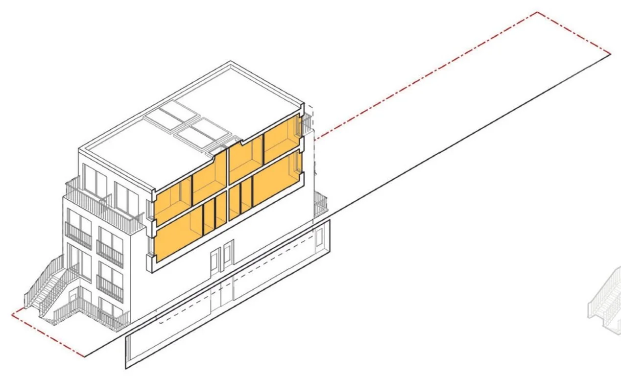Architectural diagram of a multi-story building showing an interior section with orange-highlighted rooms and structural details.
