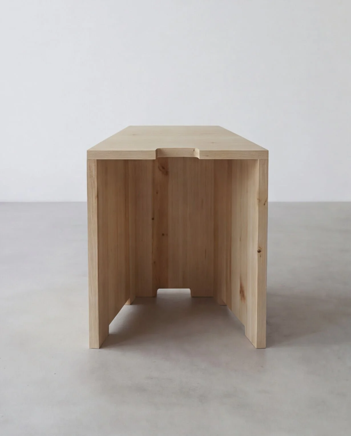 Front view of the Arbetshäst wooden stool.