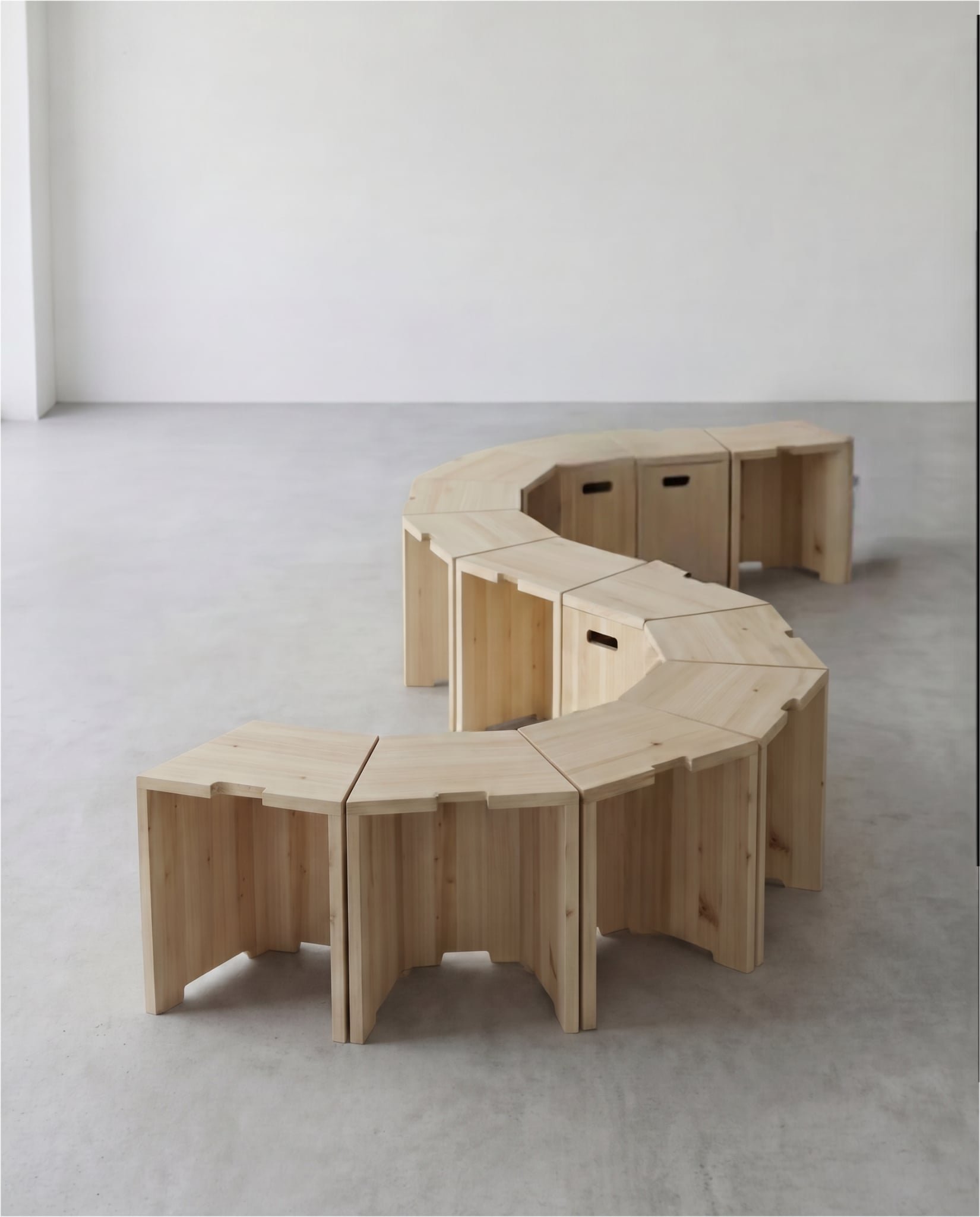 Arbetshäst stools arranged in a circular formation.