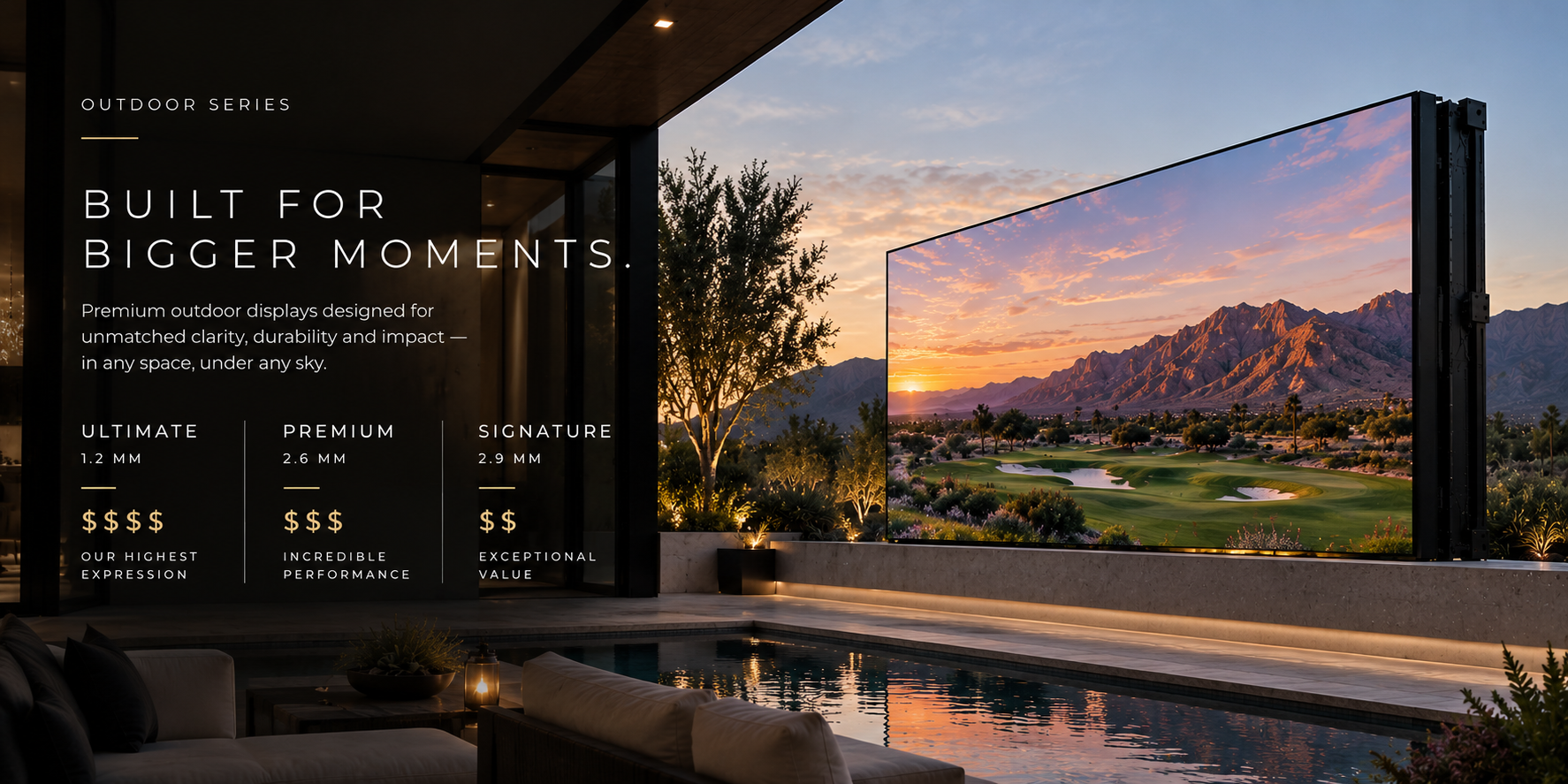 A large outdoor LED display showing a scenic sunset view of mountains and a golf course, situated outside a modern house with outdoor seating, trees, and a pool.