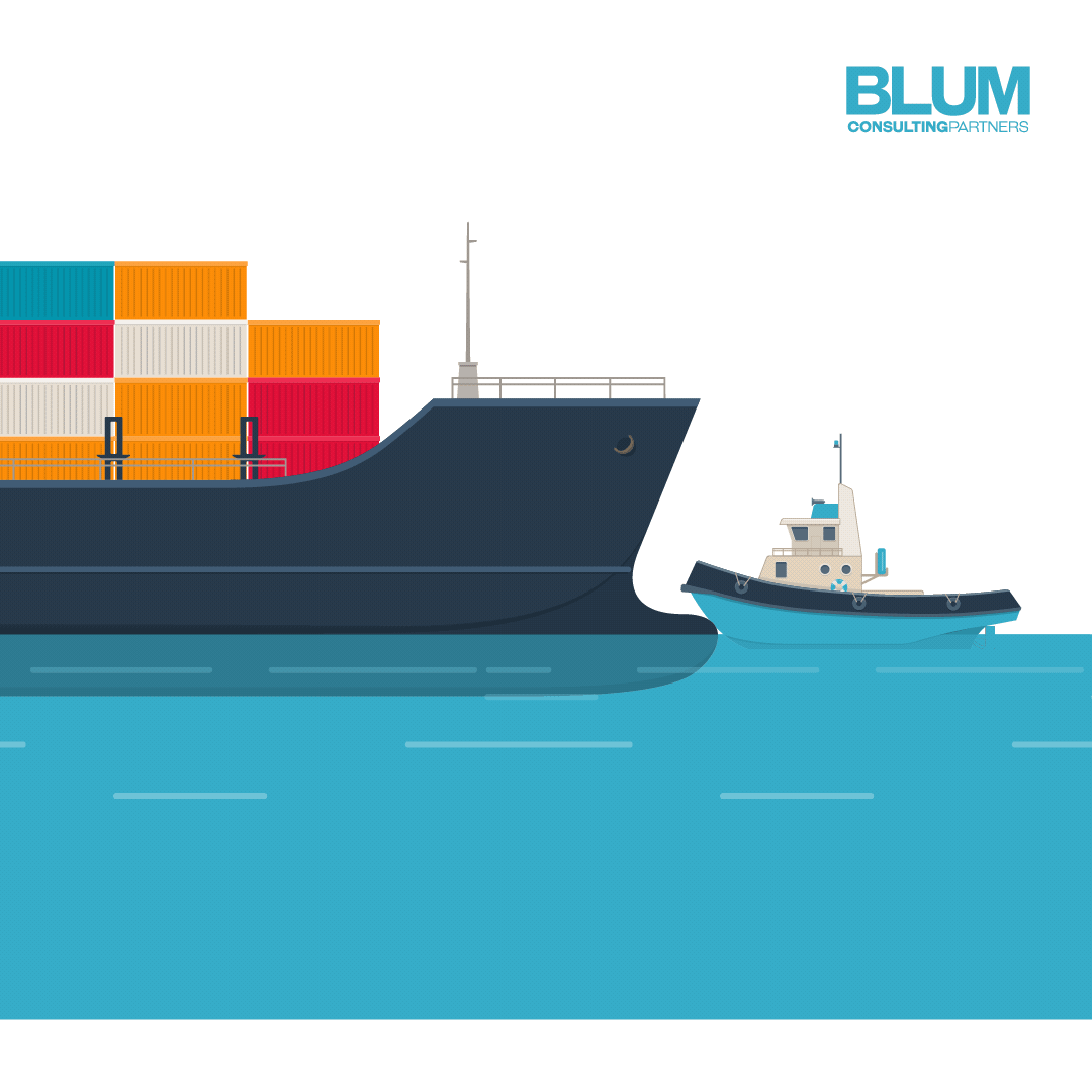 Blum Consulting Partners. Illustration of a large cargo ship with colorful containers on board sailing on the ocean, accompanied by a smaller tugboat, with a logo of BLUM Consulting Partners in the top right corner.