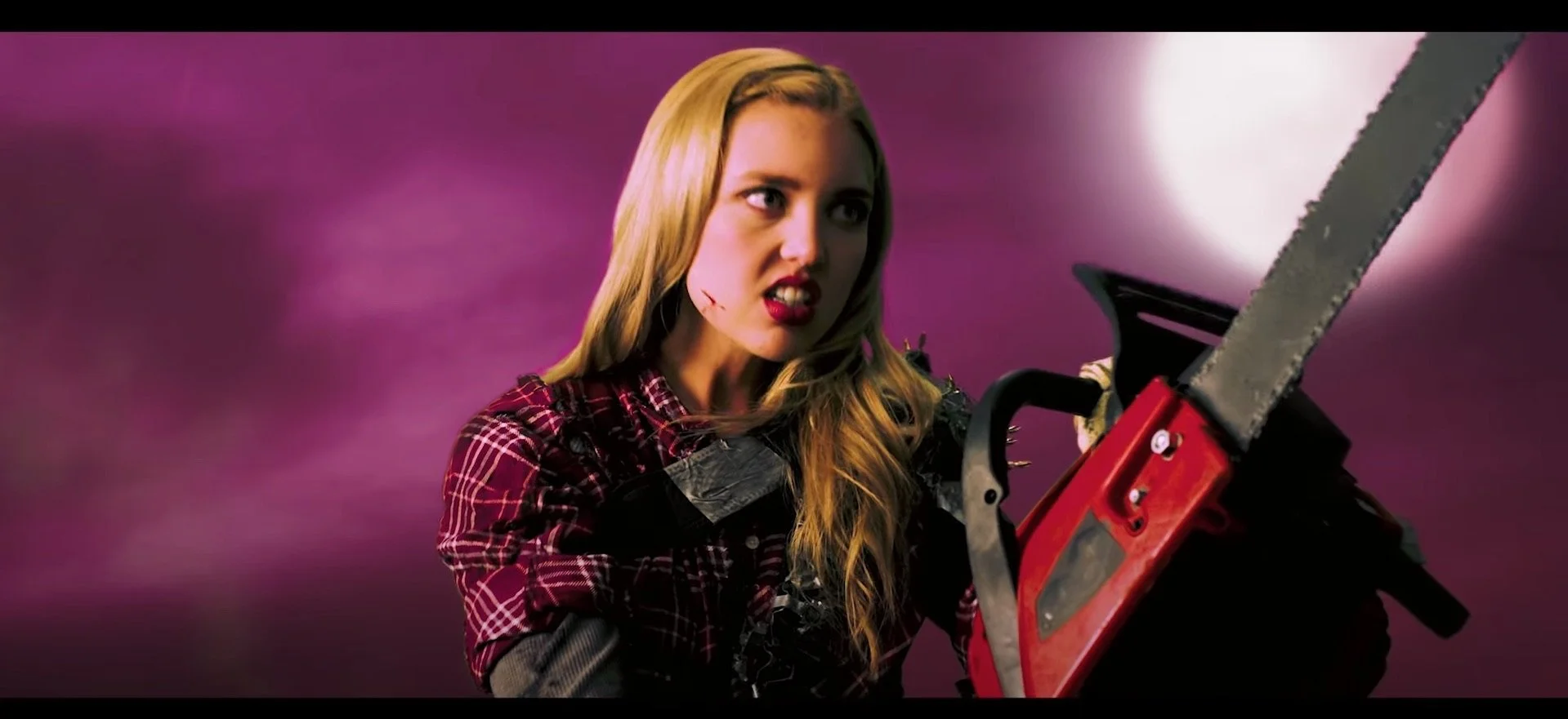 Stunt safe chainsaw built by Sam Carter for movie Banned in Boise held by the actress