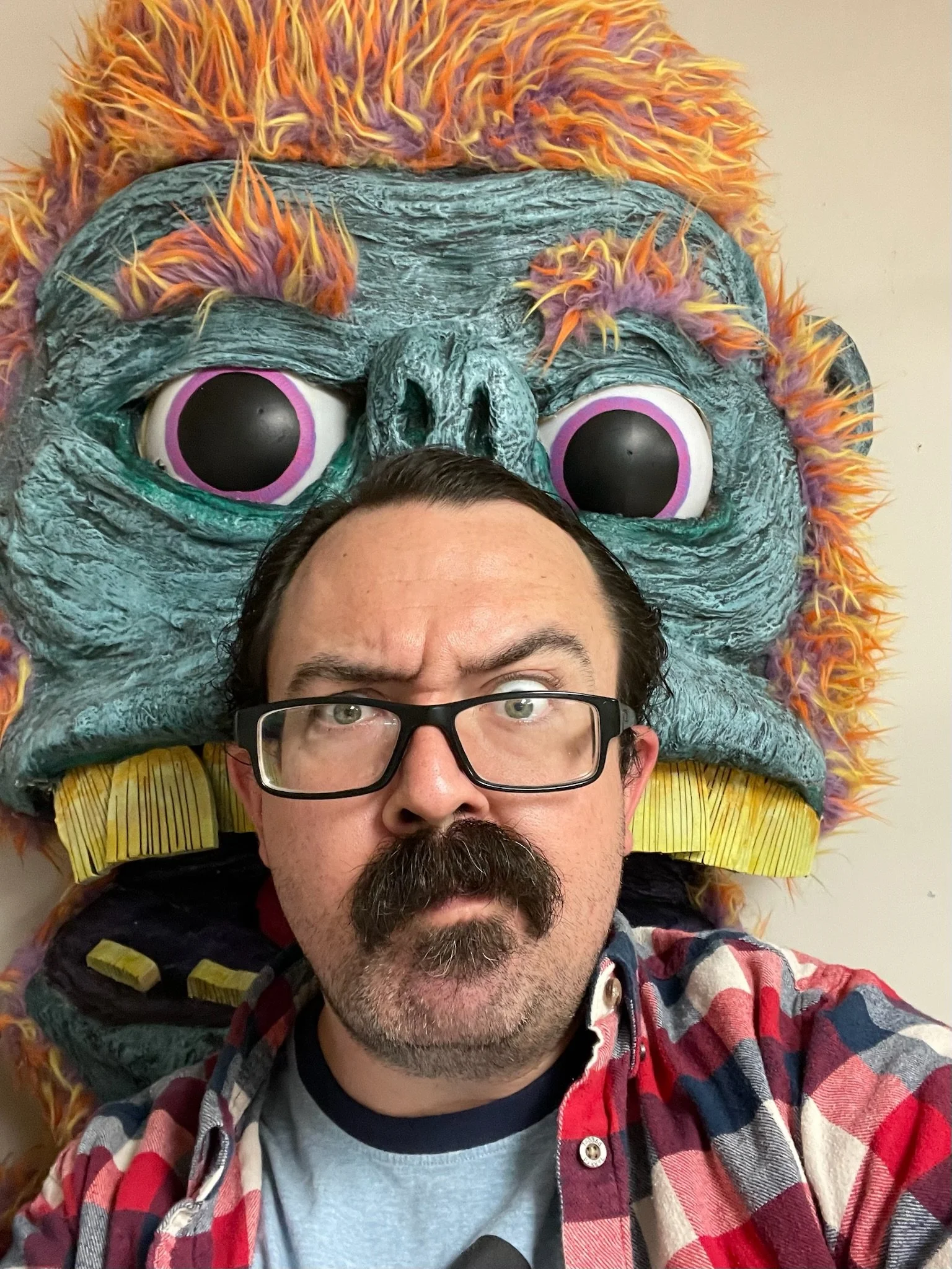 Sam carter professional puppet builder in his shop