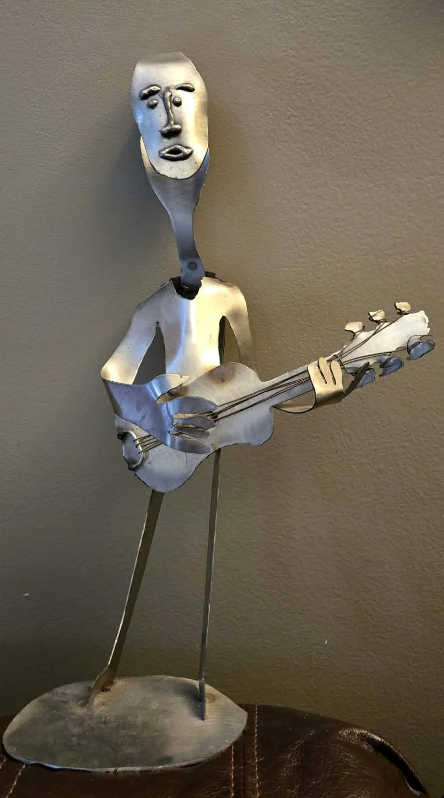 Johnny B. Goode, scrap metal guitar player sculpture by Sean McFall