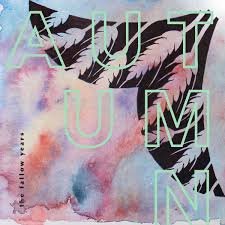 Abstract artwork with black zebra stripe pattern and pastel watercolor background, overlaid with light green text. The Fallow Years