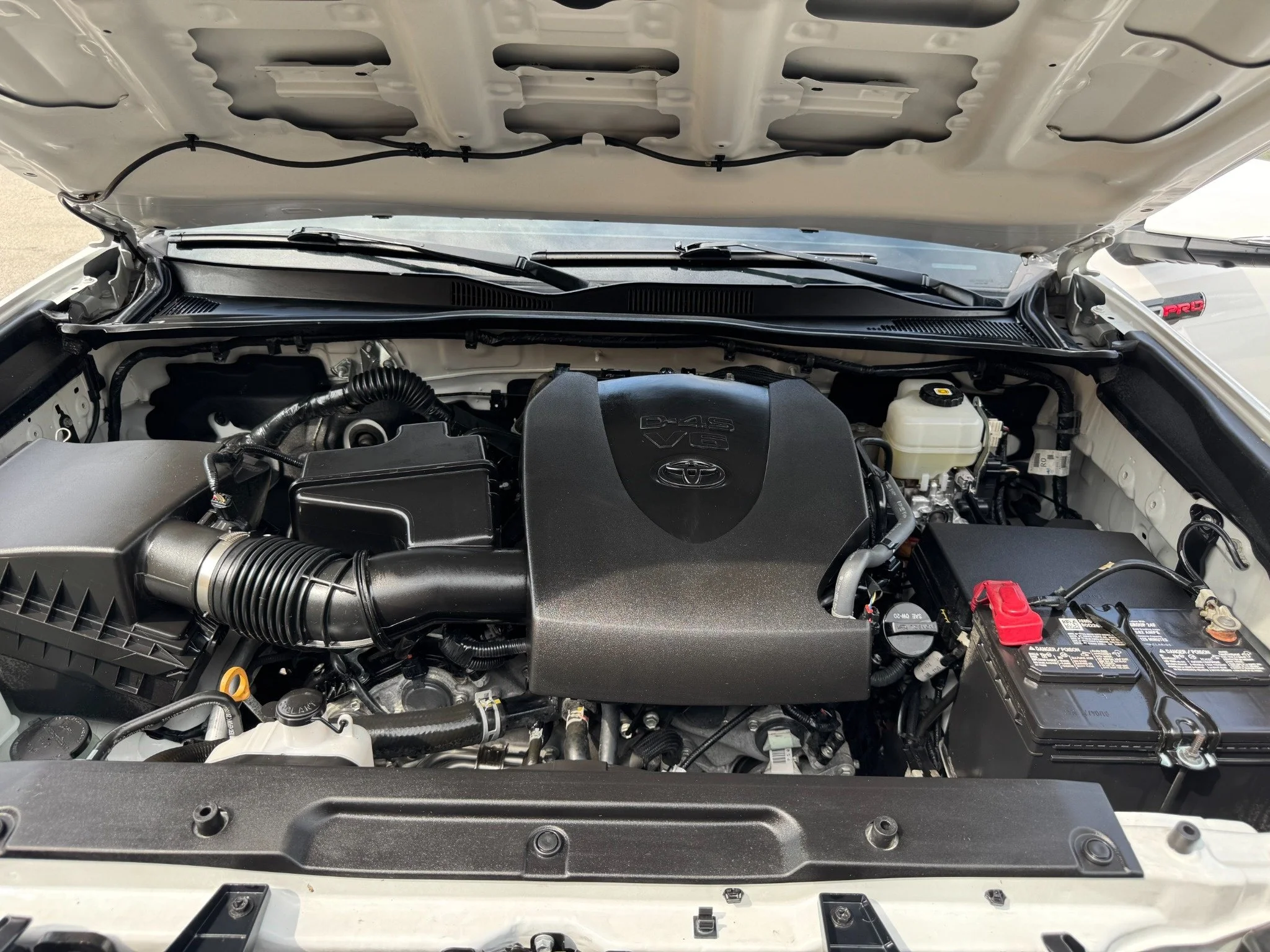 Toyota engine bay after detailing by Alpha Car Detailing in Des Plaines Illinois