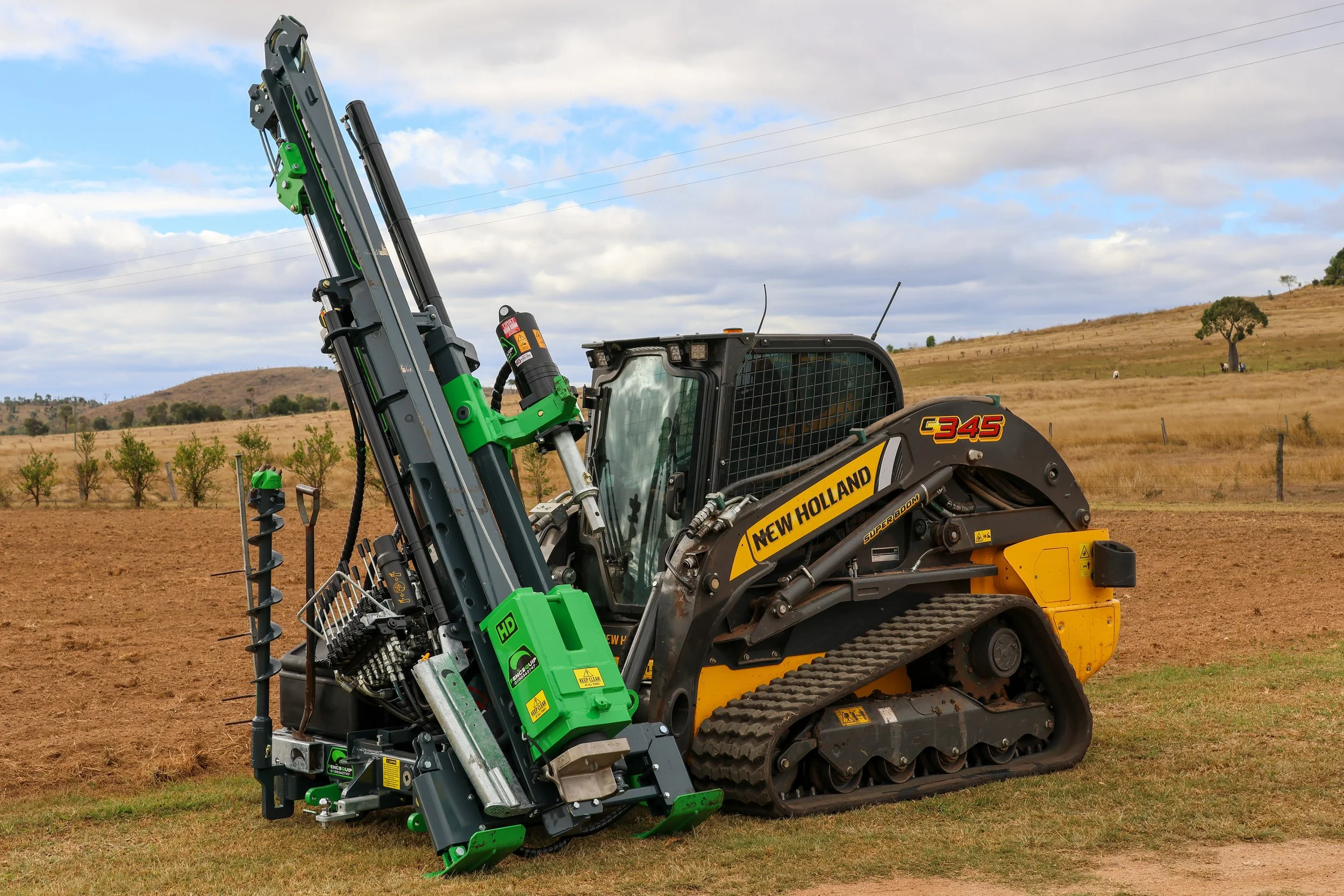 Rural fence construction near Dalby