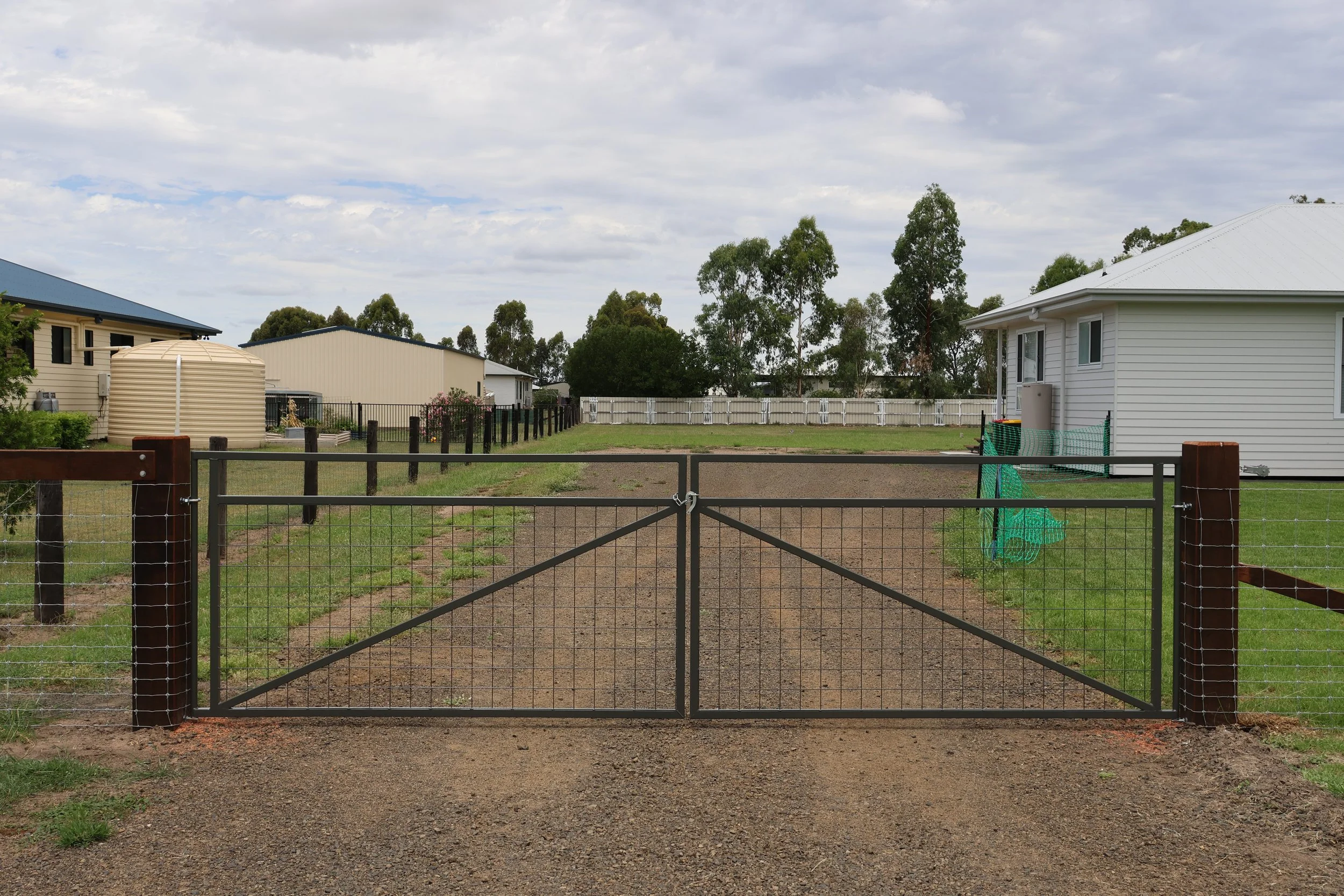 Rural fence entrance installed on a Western Downs property