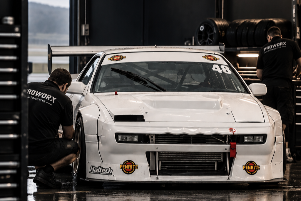 FC RX-7 Proworx race car undergoing motorsport preparation and development at the Proworx Automotive workshop in Taupō.