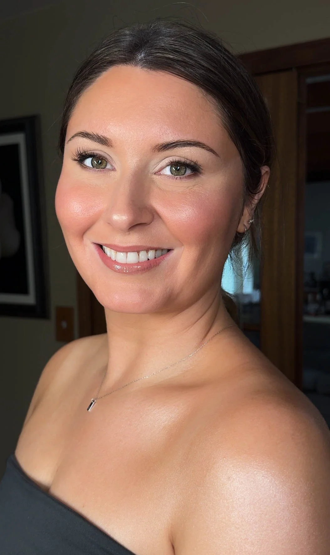 Classic bridal makeup with luminous skin, softly defined eyes and rosy cheeks.
