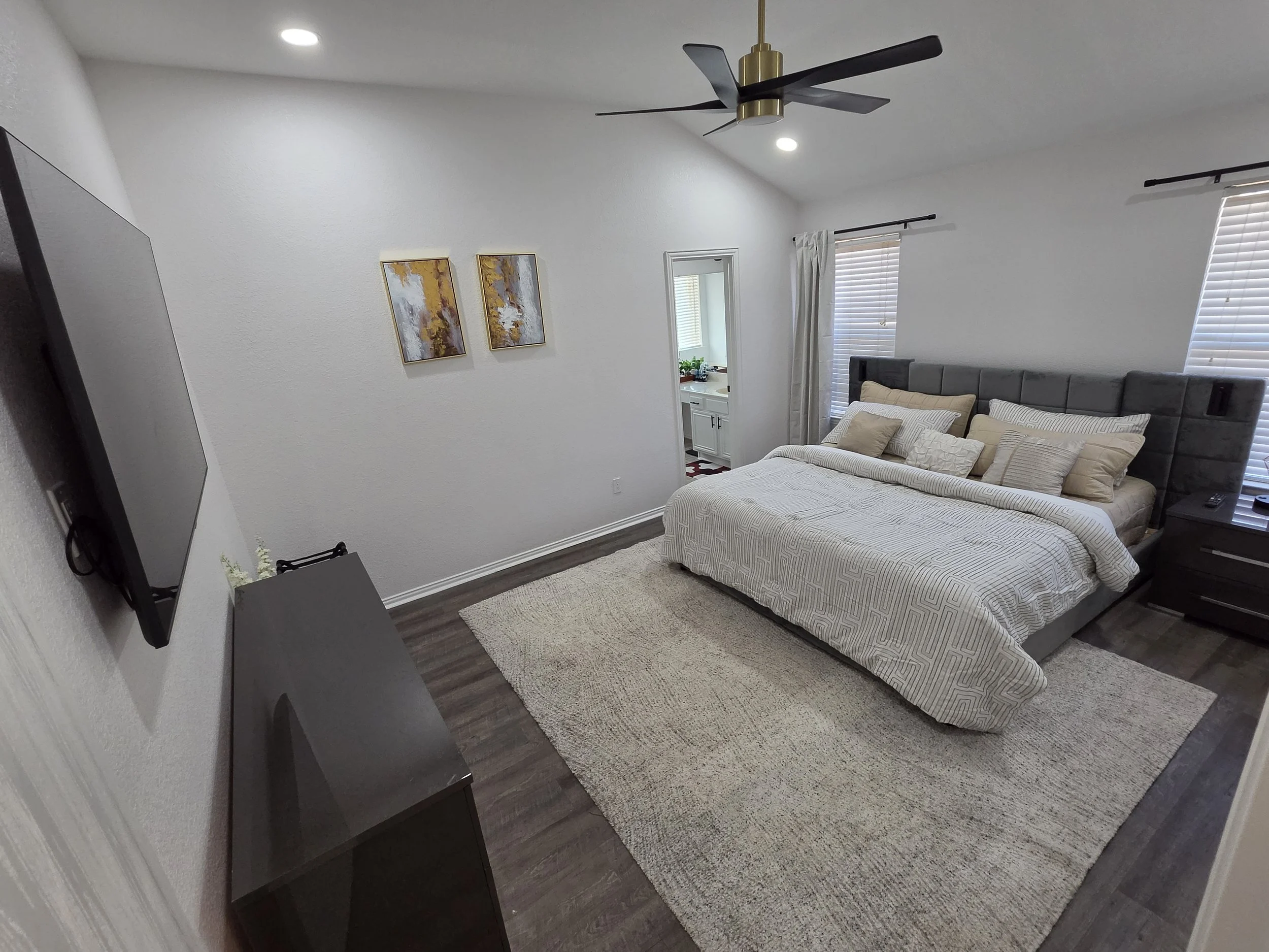 Bedroom at Ivory House McKinney with premium bedding and natural light.