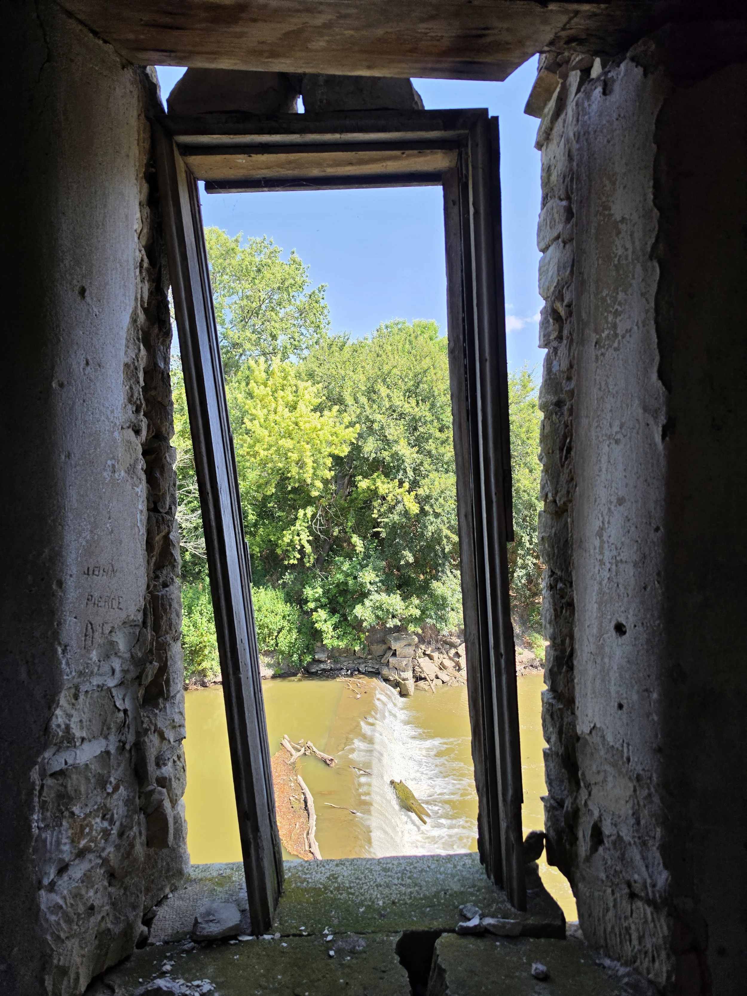 Cedar Point Mill window overlooking Cottonwood River