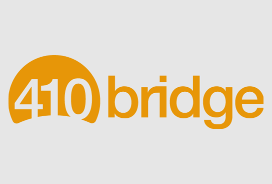 A logo with the text '410 bridge' where '410' is inside an orange semi-circle and 'bridge' is written in orange letters on a light gray background.