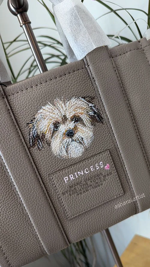 Marc Jacobs Brown leather bag with a custom painting of a small dog and the word "PRINCESS" embroidered with a small pink heart.