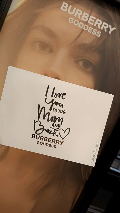 A Burberry Goddess handwritten note card with message that says, 'I love you to the moon and back' . Live Calligraphy Toronto in Sephora