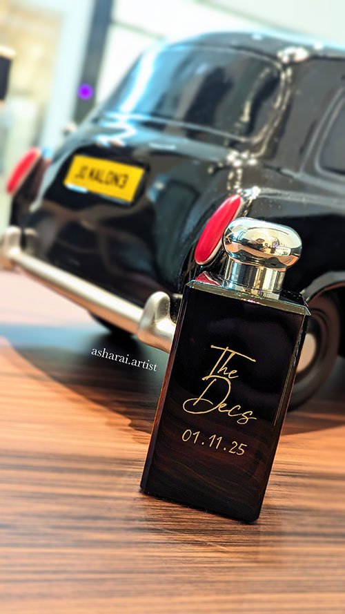 Jo Malone perfume bottle hand engraved with 'The Decs' and their special date on it.