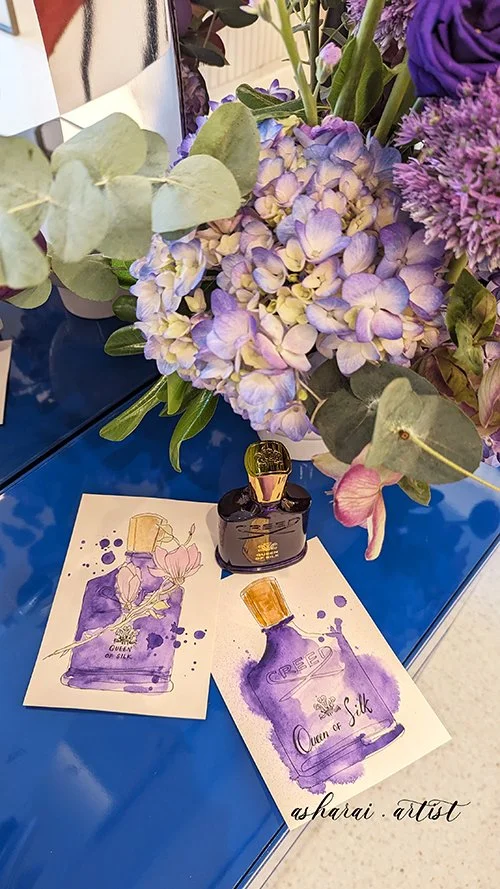 Creed Queen of Silk launch at the Holt Renfrew Bloor Café VIP event, featuring live watercolor illustrations by a luxury event artist.