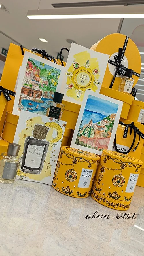 Live watercolor illustrations by AshaRai ,Live event artist for an exclusive Acqua di Parma VIP event at Holt Renfrew Bloor, Toronto,featuring hand-painted Amalfi Coast postcards inspired by Italy’s coastal beauty.