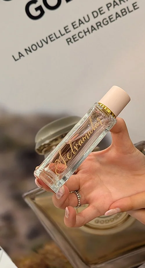 Burberry Her perfume bottle personalized with hand engraving.