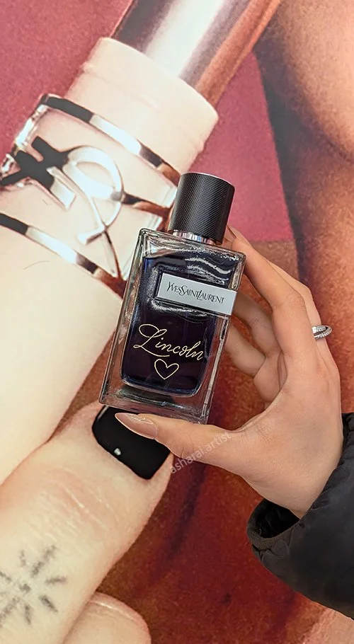 Yves Saint Laurent Y perfume bottle personalized with custom hand engraving.